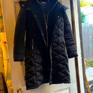 Long Calvin Klein coat W/fur hood brand new w/out tags size Small